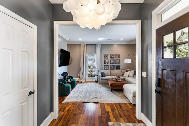 311 Grace St, Nashville, TN 37207 - entrance foyer with wood-type flooring, a chandelier, healthy amount of natural light, crown molding, and baseboards