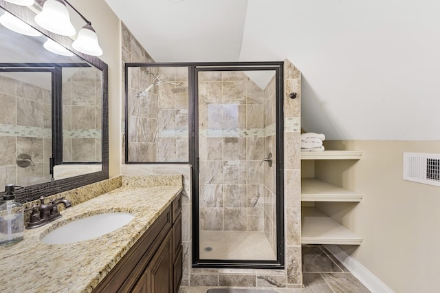 311 Grace St, Nashville, TN 37207 - bathroom with vanity, a stall shower, and baseboards