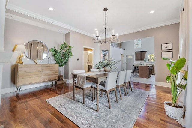 311 Grace St, Nashville, TN 37207 - dining space with a chandelier, ornamental molding, baseboards, hardwood / wood-style floors, and recessed lighting