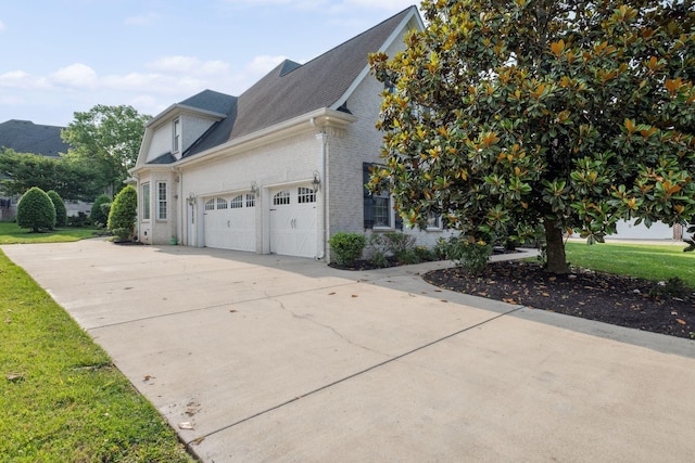 3334 Granite Springs Way, Murfreesboro, TN 37130 - view of side of property featuring brick siding, a garage, driveway, a shingled roof, and a yard