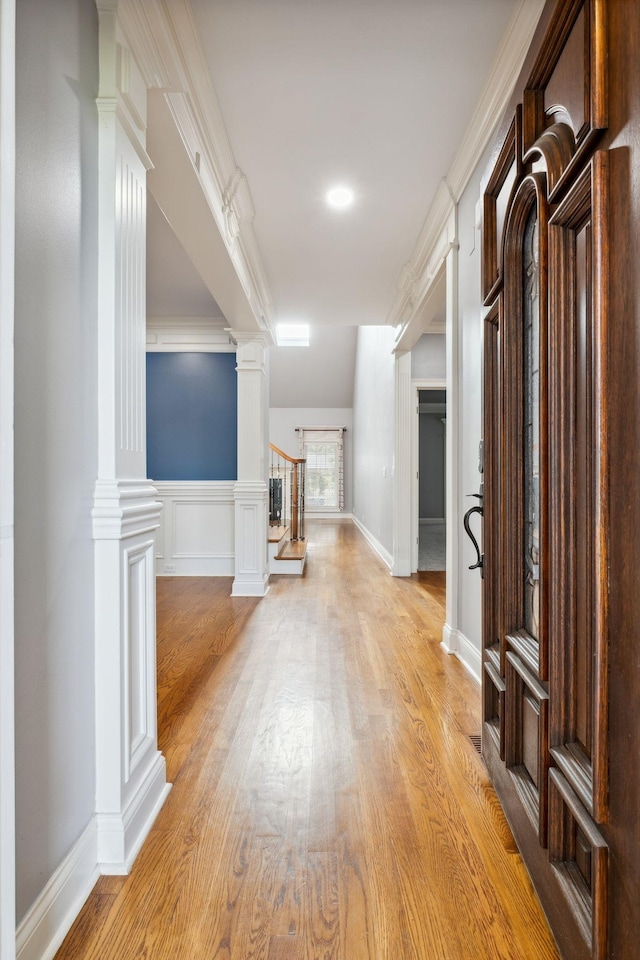 3334 Granite Springs Way, Murfreesboro, TN 37130 - hallway with decorative columns, light wood-style flooring, stairs, and crown molding
