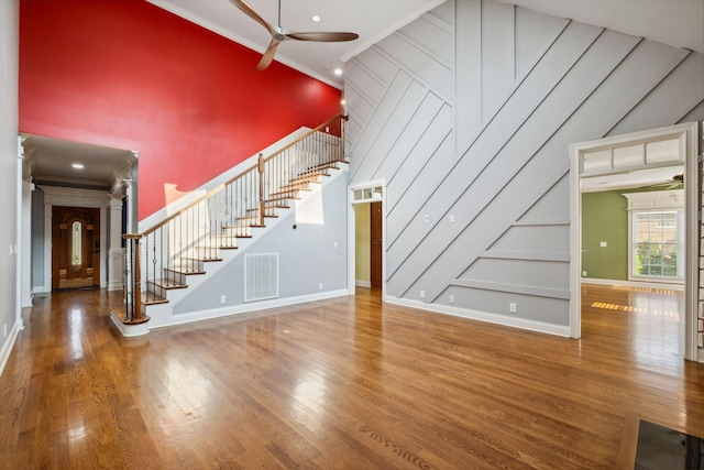 3334 Granite Springs Way, Murfreesboro, TN 37130 - unfurnished living room with stairway, a ceiling fan, crown molding, wood finished floors, and baseboards