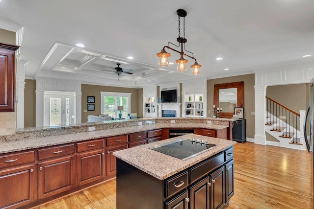 525 Amberly St, Murfreesboro, TN 37129 - kitchen with black electric cooktop, crown molding, light wood-style flooring, a ceiling fan, and open floor plan