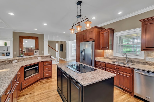 525 Amberly St, Murfreesboro, TN 37129 - kitchen featuring black appliances, a sink, ornate columns, crown molding, and backsplash