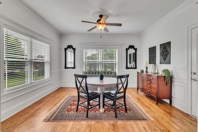 525 Amberly St, Murfreesboro, TN 37129 - dining room featuring light wood-type flooring, ceiling fan, ornamental molding, a decorative wall, and a wainscoted wall