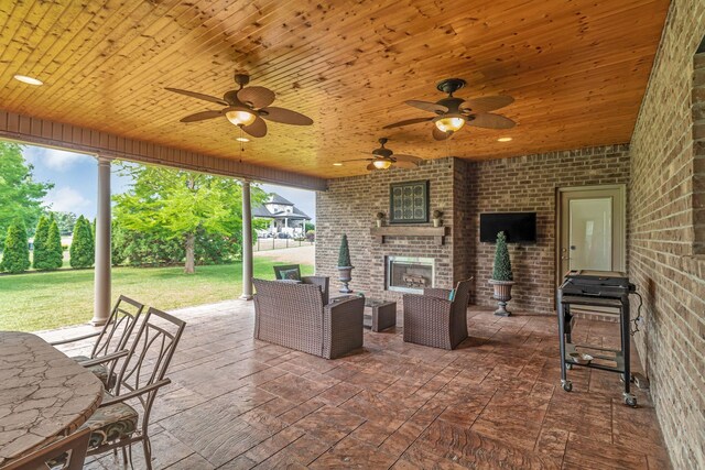 525 Amberly St, Murfreesboro, TN 37129 - view of patio / terrace featuring an outdoor brick fireplace and ceiling fan
