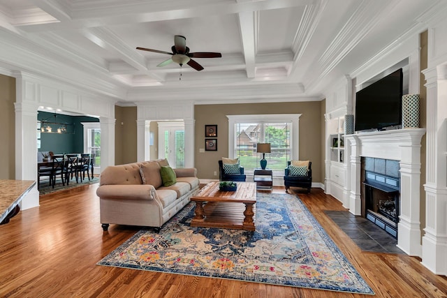 525 Amberly St, Murfreesboro, TN 37129 - living room with coffered ceiling, ceiling fan, wood finished floors, crown molding, and a tile fireplace