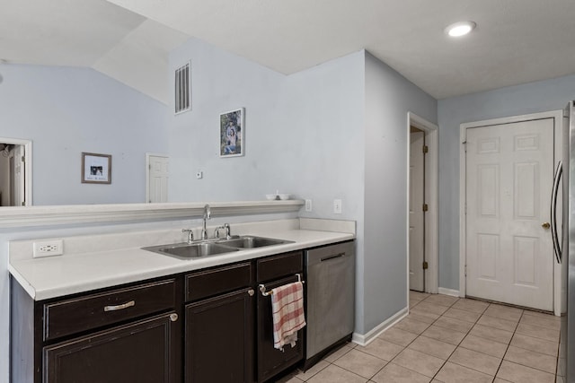 105 Patana Dr, White House, TN 37188 - kitchen with a sink, light tile patterned flooring, dishwasher, light countertops, and vaulted ceiling
