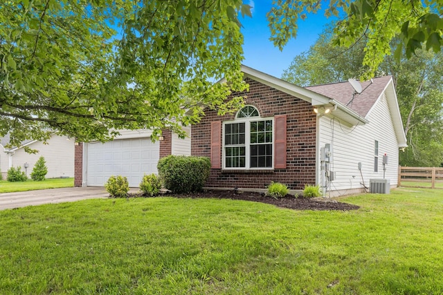 105 Patana Dr, White House, TN 37188 - view of front of property featuring a garage, brick siding, concrete driveway, roof with shingles, and central air condition unit