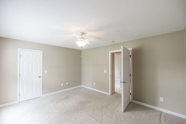 3505 Grove Park Dr, College Grove, TN 37046 - unfurnished bedroom with light colored carpet, baseboards, and ceiling fan