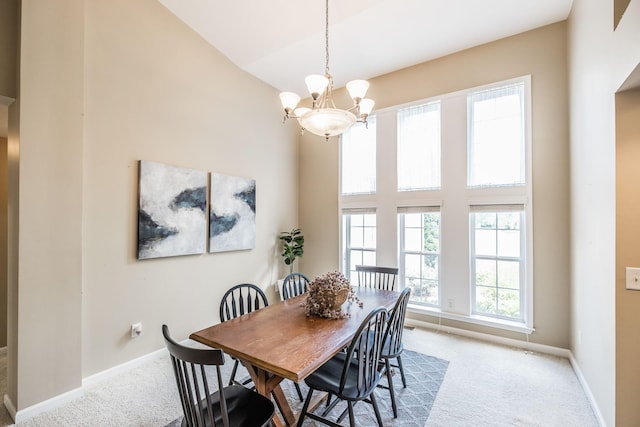 3505 Grove Park Dr, College Grove, TN 37046 - dining room with carpet, a chandelier, high vaulted ceiling, and baseboards