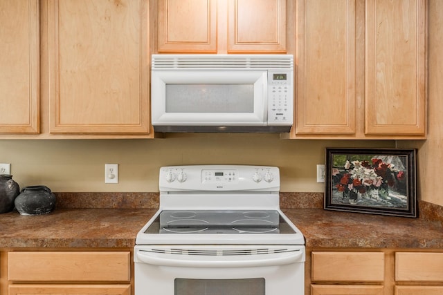 3505 Grove Park Dr, College Grove, TN 37046 - kitchen featuring white appliances, light brown cabinetry, and dark countertops