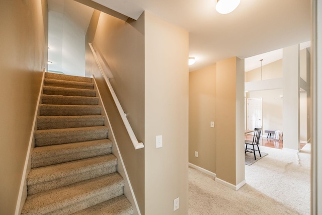 3505 Grove Park Dr, College Grove, TN 37046 - stairs with carpet flooring, vaulted ceiling, and baseboards