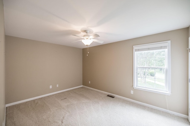 3505 Grove Park Dr, College Grove, TN 37046 - empty room featuring a ceiling fan, light colored carpet, and baseboards