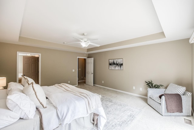 3505 Grove Park Dr, College Grove, TN 37046 - bedroom featuring a raised ceiling, baseboards, light carpet, and a ceiling fan