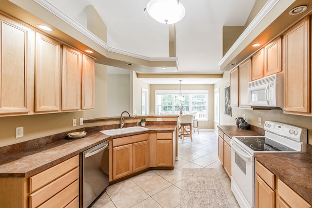 3505 Grove Park Dr, College Grove, TN 37046 - kitchen with white appliances, a sink, a peninsula, light tile patterned floors, and dark countertops