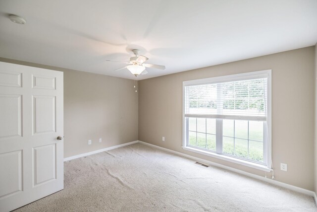 3505 Grove Park Dr, College Grove, TN 37046 - spare room with carpet floors, a ceiling fan, baseboards, and a smoke detector
