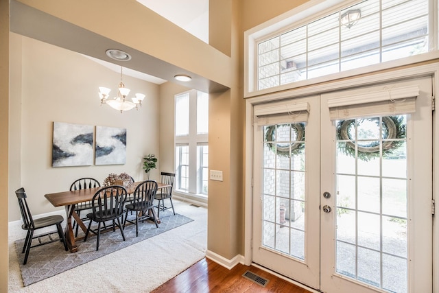 3505 Grove Park Dr, College Grove, TN 37046 - entrance foyer featuring a chandelier, wood finished floors, healthy amount of natural light, baseboards, and a high ceiling