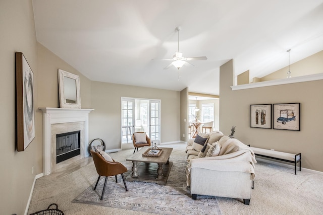 3505 Grove Park Dr, College Grove, TN 37046 - carpeted living room featuring vaulted ceiling, a high end fireplace, baseboards, and ceiling fan