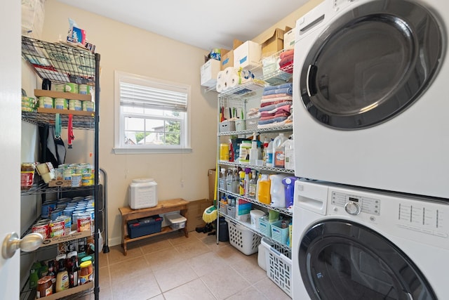 4702 Garcia Blvd, Murfreesboro, TN 37128 - laundry area with stacked washing machine and dryer and tile patterned floors