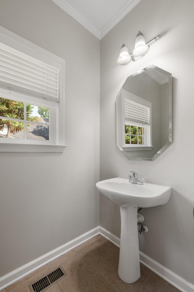 4702 Garcia Blvd, Murfreesboro, TN 37128 - bathroom featuring baseboards, tile patterned flooring, and crown molding