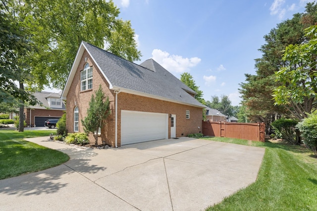 4702 Garcia Blvd, Murfreesboro, TN 37128 - view of side of property with brick siding, roof with shingles, and driveway