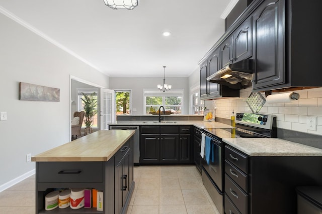 4702 Garcia Blvd, Murfreesboro, TN 37128 - kitchen with appliances with stainless steel finishes, a sink, under cabinet range hood, decorative backsplash, and a chandelier