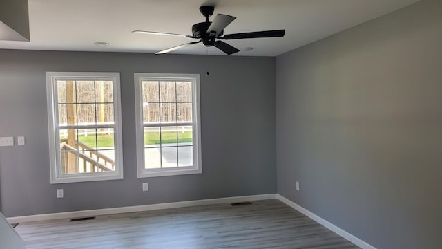 171 Ashmore Rd, Summertown, TN 38483 - unfurnished room featuring wood finished floors, baseboards, and ceiling fan