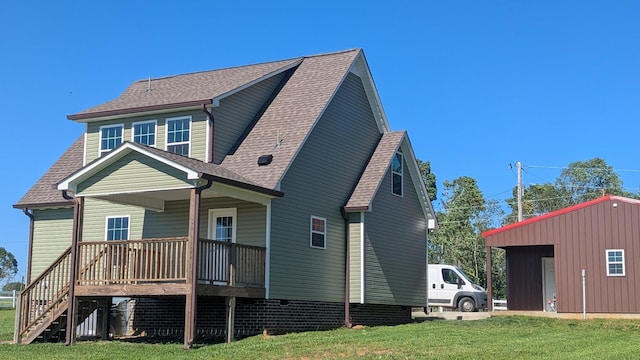 171 Ashmore Rd, Summertown, TN 38483 - view of side of home with roof with shingles, covered porch, a lawn, and stairs