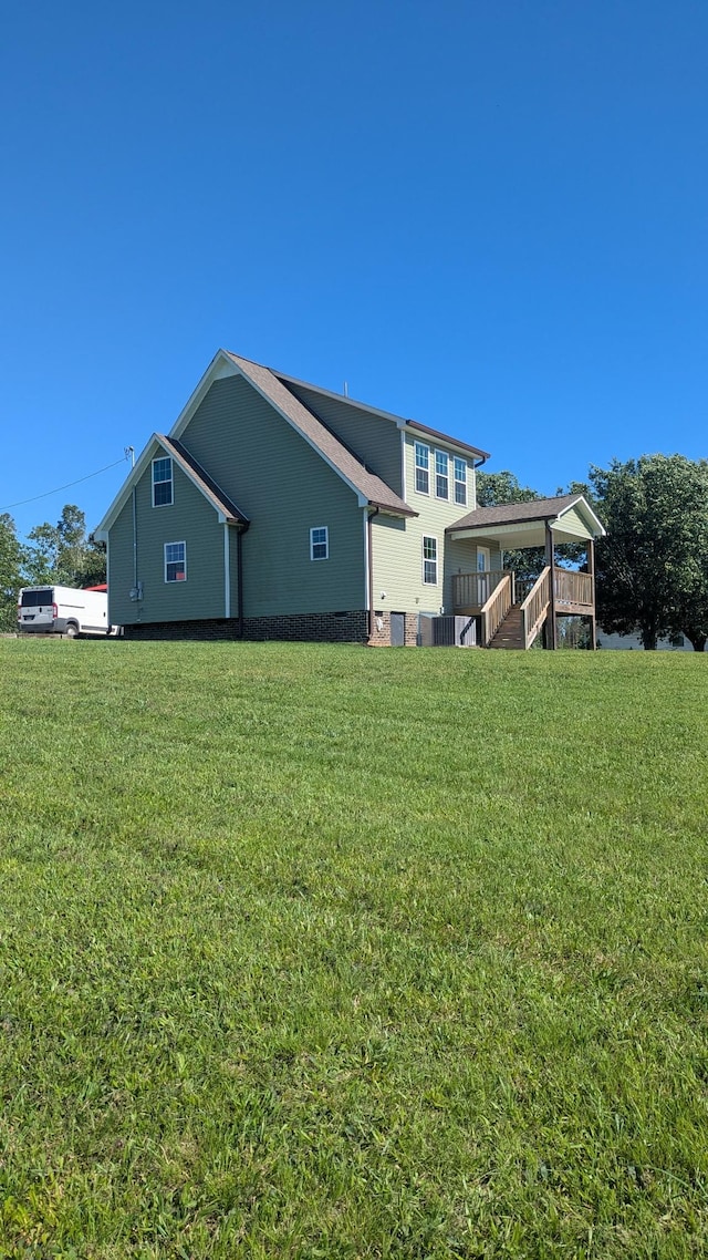 171 Ashmore Rd, Summertown, TN 38483 - back of house with a yard
