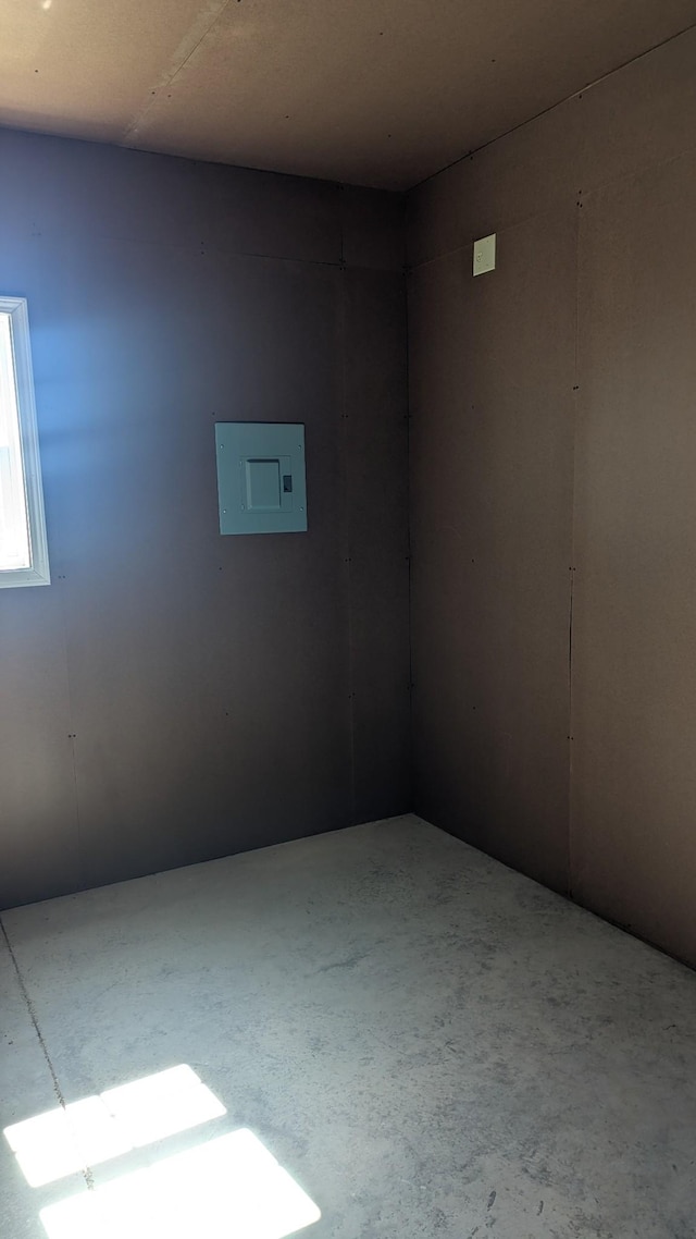 171 Ashmore Rd, Summertown, TN 38483 - empty room featuring electric panel and unfinished concrete floors
