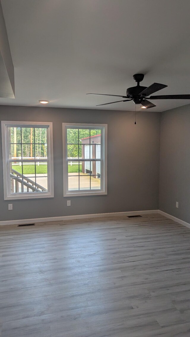 171 Ashmore Rd, Summertown, TN 38483 - spare room with wood finished floors, baseboards, and a ceiling fan
