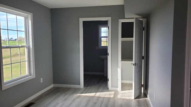 171 Ashmore Rd, Summertown, TN 38483 - unfurnished bedroom featuring wood finished floors and baseboards