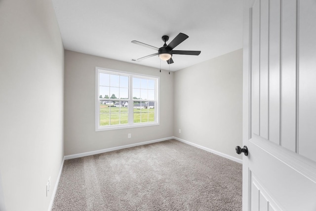 2586 Rafiki Dr, Clarksville, TN 37042 - spare room with carpet floors, baseboards, and a ceiling fan