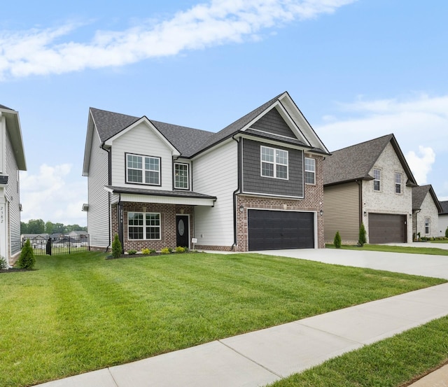 2586 Rafiki Dr, Clarksville, TN 37042 - craftsman house with a garage, brick siding, concrete driveway, and a shingled roof