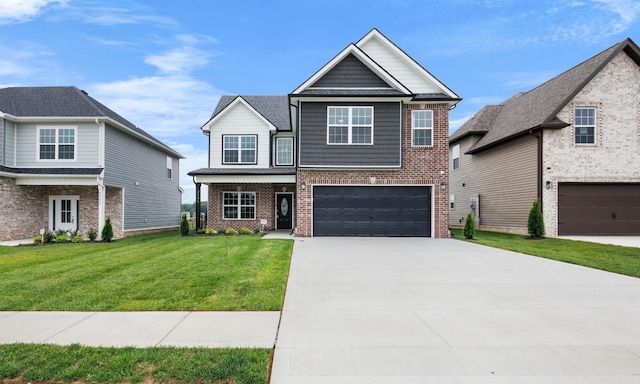 2586 Rafiki Dr, Clarksville, TN 37042 - craftsman inspired home featuring brick siding, a garage, a front lawn, and driveway