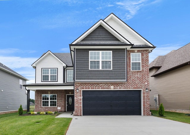 2586 Rafiki Dr, Clarksville, TN 37042 - view of front facade featuring driveway, brick siding, a garage, and a front lawn