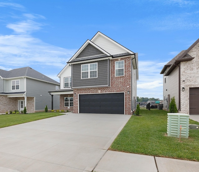 2586 Rafiki Dr, Clarksville, TN 37042 - view of front of property with brick siding, driveway, and a garage