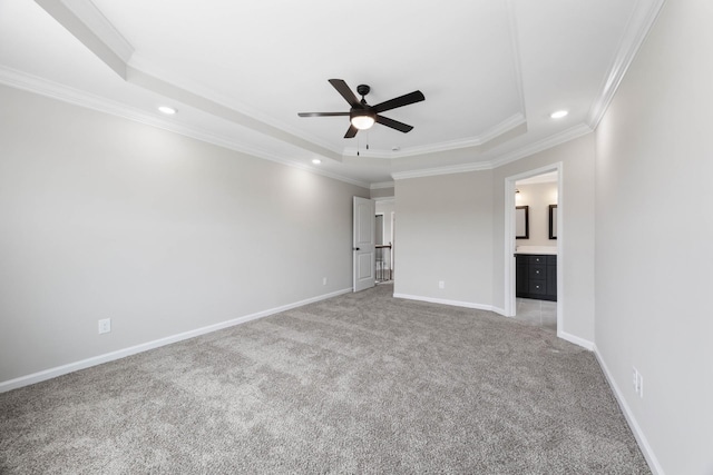 2586 Rafiki Dr, Clarksville, TN 37042 - spare room with a tray ceiling, recessed lighting, a ceiling fan, light colored carpet, and crown molding