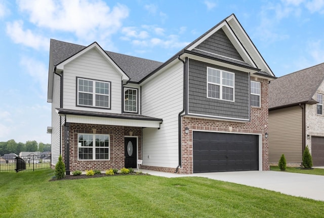 2586 Rafiki Dr, Clarksville, TN 37042 - view of front of property with driveway, a garage, brick siding, and roof with shingles