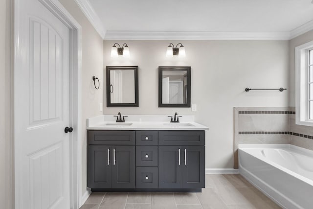 2586 Rafiki Dr, Clarksville, TN 37042 - bathroom featuring double vanity, a garden tub, crown molding, baseboards, and tile patterned floors