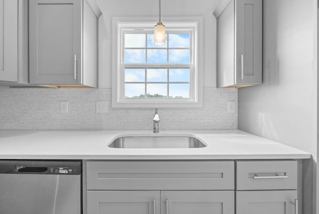 2582 Rafiki Dr, Clarksville, TN 37042 - kitchen with dishwasher, a sink, and gray cabinets