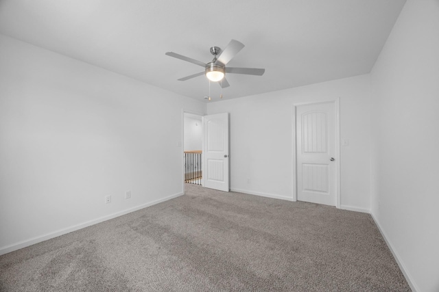 2582 Rafiki Dr, Clarksville, TN 37042 - unfurnished bedroom featuring carpet floors, baseboards, and ceiling fan