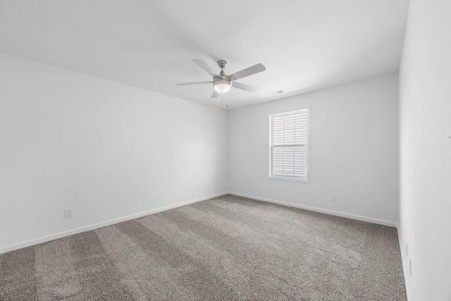 2582 Rafiki Dr, Clarksville, TN 37042 - carpeted empty room featuring a ceiling fan and baseboards