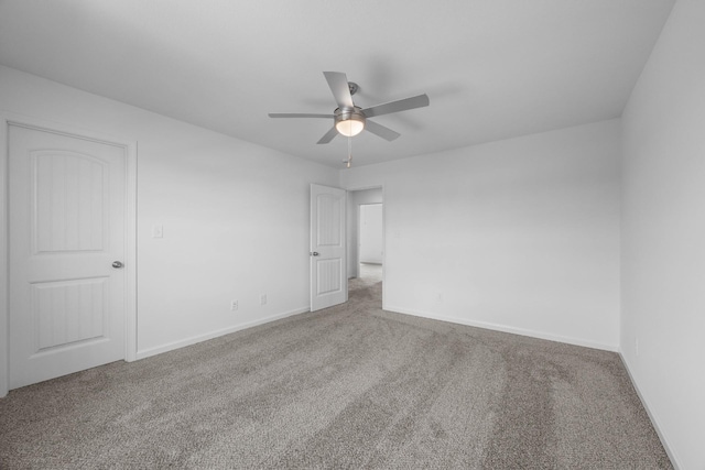 2582 Rafiki Dr, Clarksville, TN 37042 - unfurnished bedroom with carpet flooring, baseboards, and ceiling fan