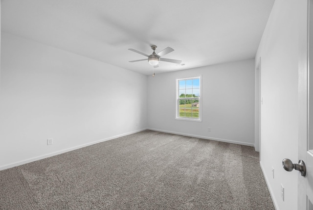 2582 Rafiki Dr, Clarksville, TN 37042 - unfurnished room with carpet, a ceiling fan, and baseboards