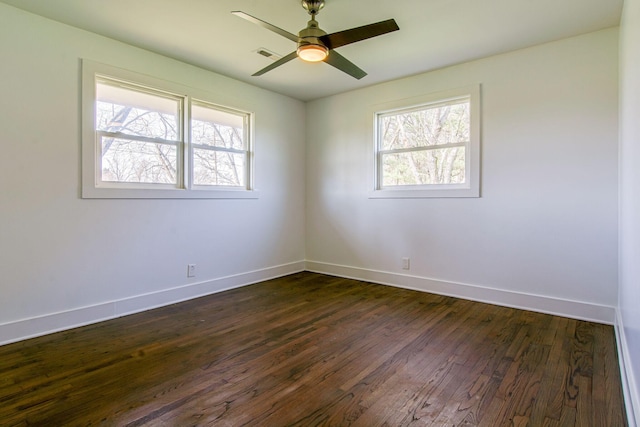 1655 Ben Johns Rd, Smyrna, TN 37167 - empty room with healthy amount of natural light, dark wood-type flooring, baseboards, and a ceiling fan
