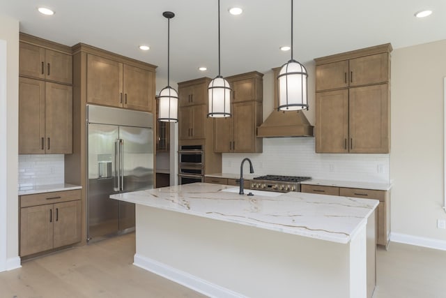 5962 Hunt Valley Dr, Spring Hill, TN 37174 - kitchen featuring stainless steel appliances, decorative backsplash, a sink, hanging light fixtures, and recessed lighting