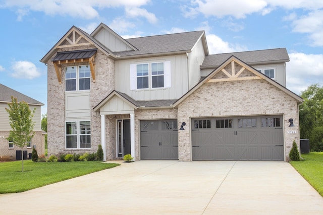 5962 Hunt Valley Dr, Spring Hill, TN 37174 - view of front facade featuring board and batten siding, driveway, a front lawn, central AC unit, and roof with shingles
