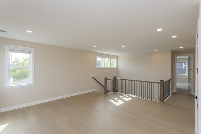 5962 Hunt Valley Dr, Spring Hill, TN 37174 - empty room with light wood-style flooring, recessed lighting, and baseboards
